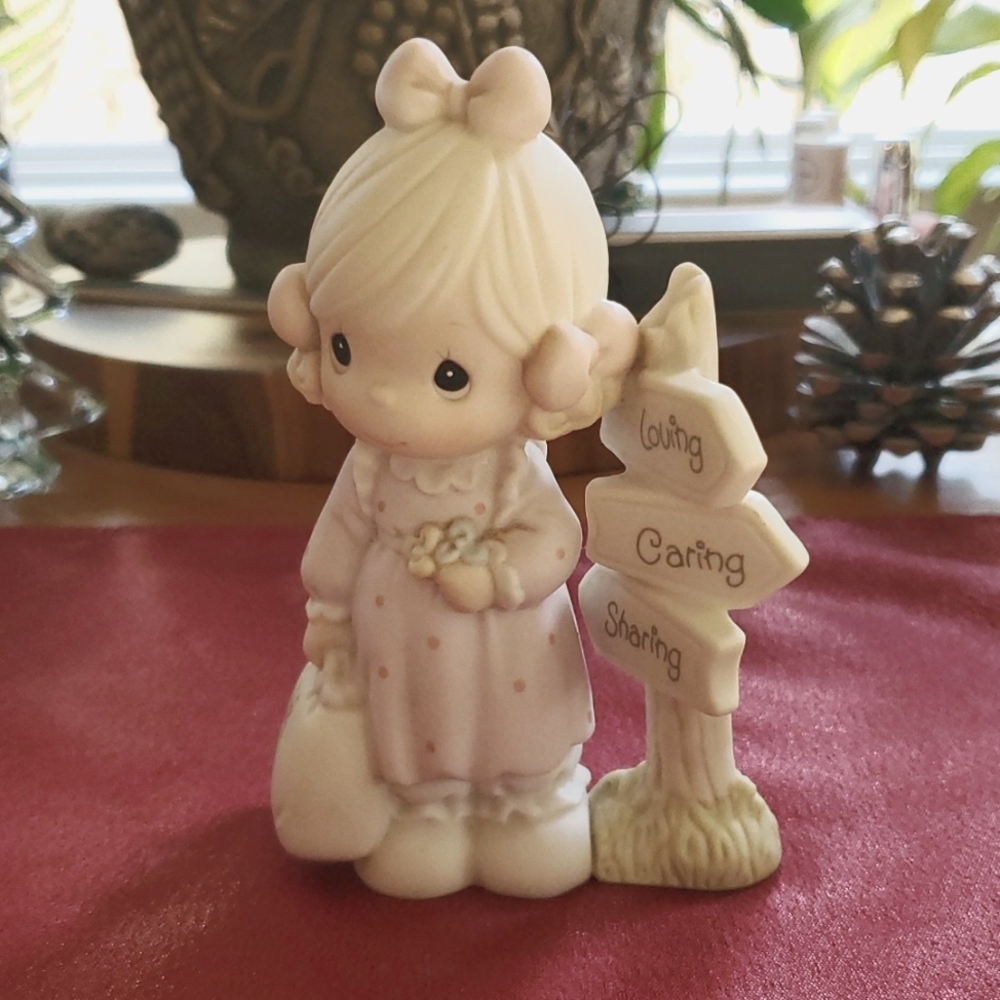 Precious Moments loving, caring sharing statue
